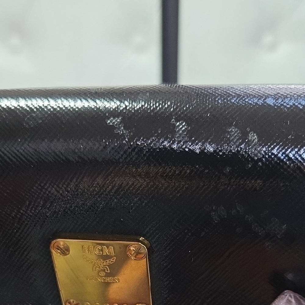 black MCM Mini crossbody bag with gold-plated hardware. - Picture 5 of 8